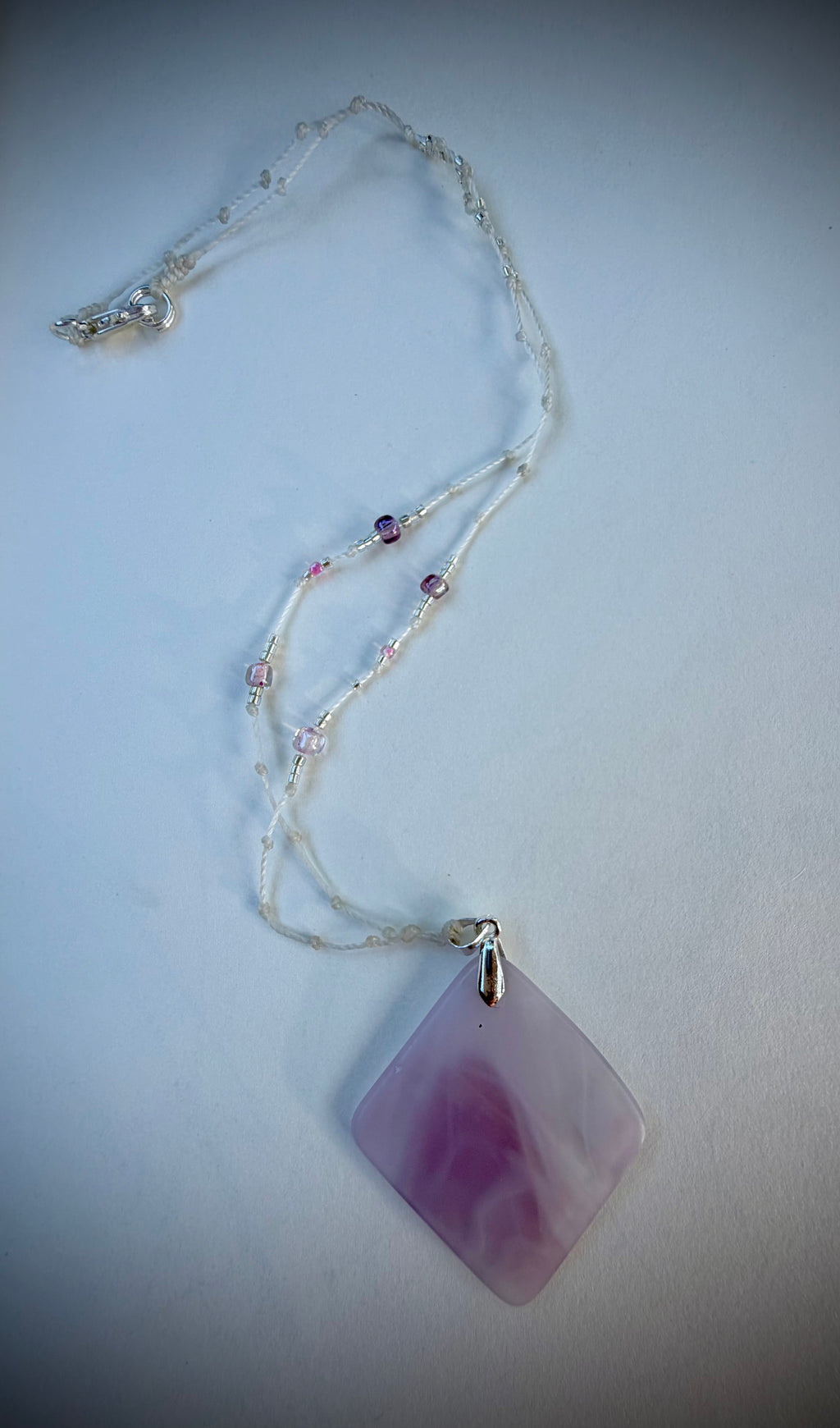 Pink swirl glass necklace