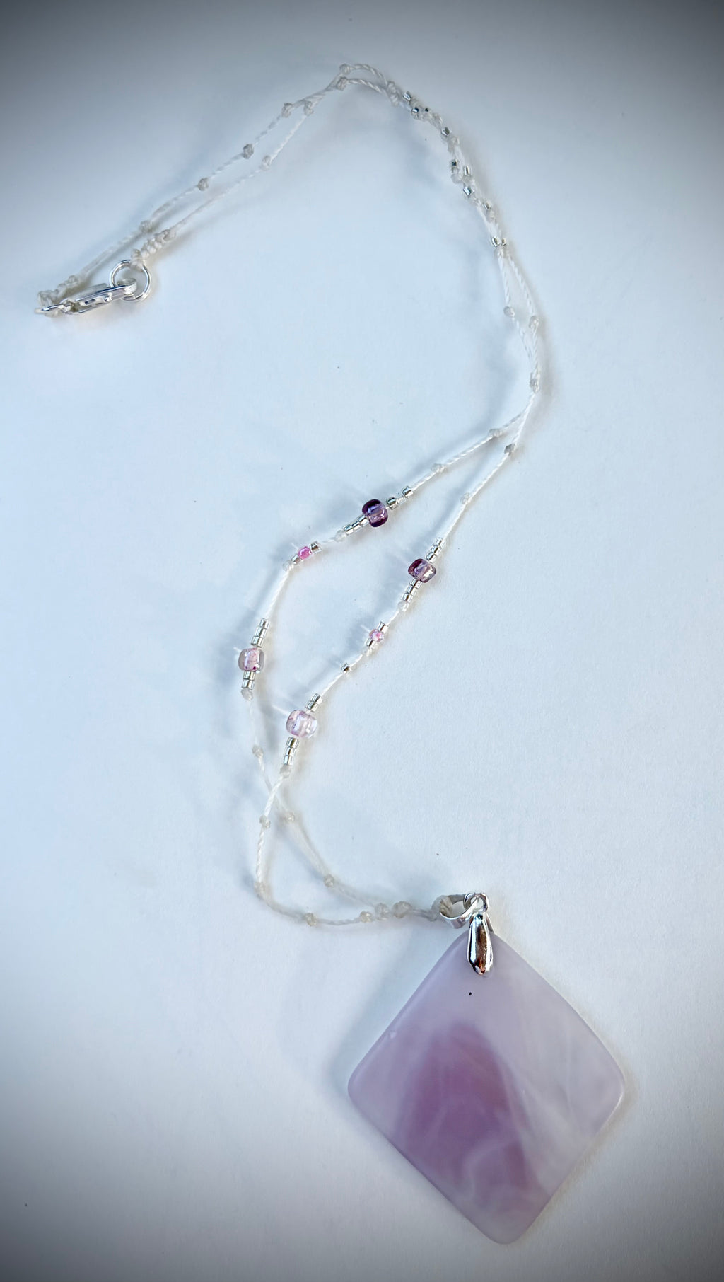 Pink swirl glass necklace